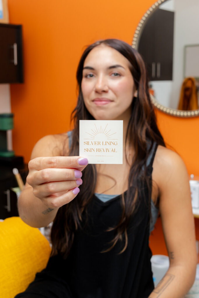 Photo of Hailey with her business card